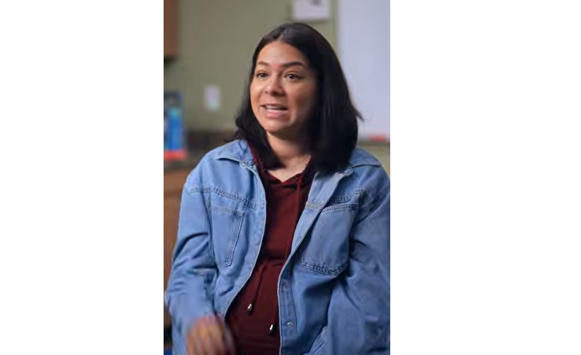 Horizon parent wearing jean jacket talking about positive impact Horizon has made on her child.