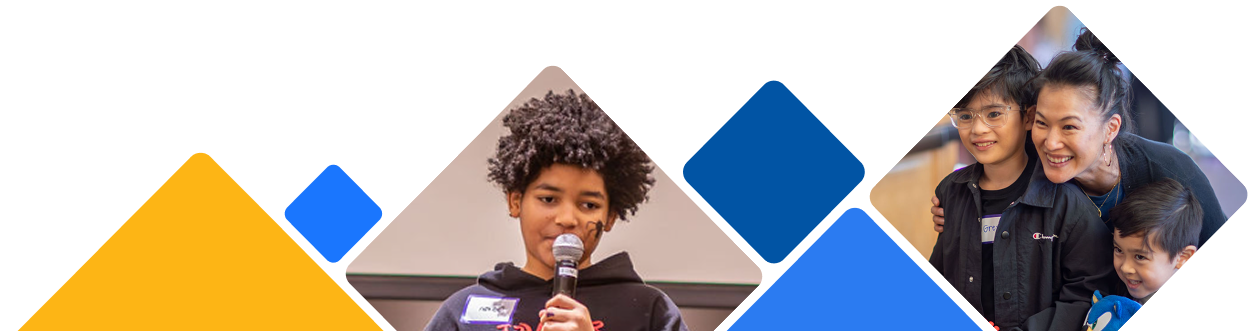 A wide banner-style image with blue and yellow geometric shapes. In the center, a student speaks into a handheld microphone. On the right, a smiling teacher poses with two young students.